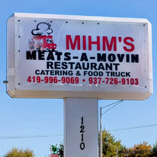 Meats-A-Movin restaurant sign