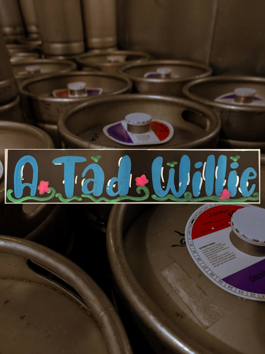 Kegs full of A Tad Willie blonde ale beer.