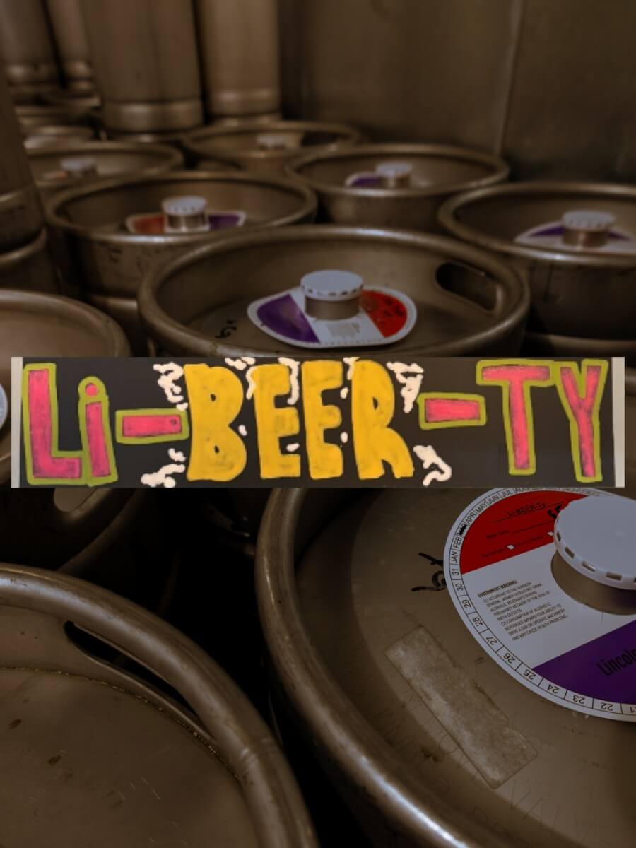 Kegs full of Li-BEER-Ty beer, which is a Kolsch.