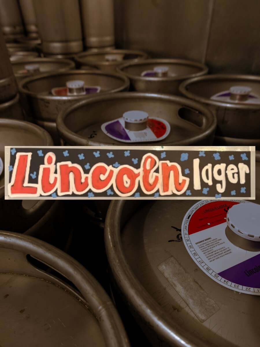 Kegs full of a Pils Lager beer named Lincoln Lager.